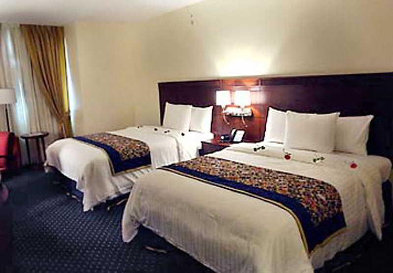 Hodelpa Garden Court Hotel Santiago De Los Caballeros Szoba fotó
