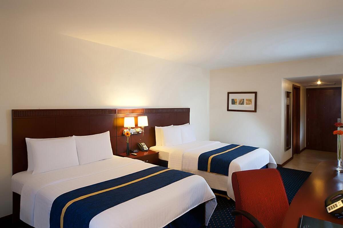 Hodelpa Garden Court Hotel Santiago De Los Caballeros Kültér fotó